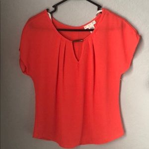 Bright  orange blouse